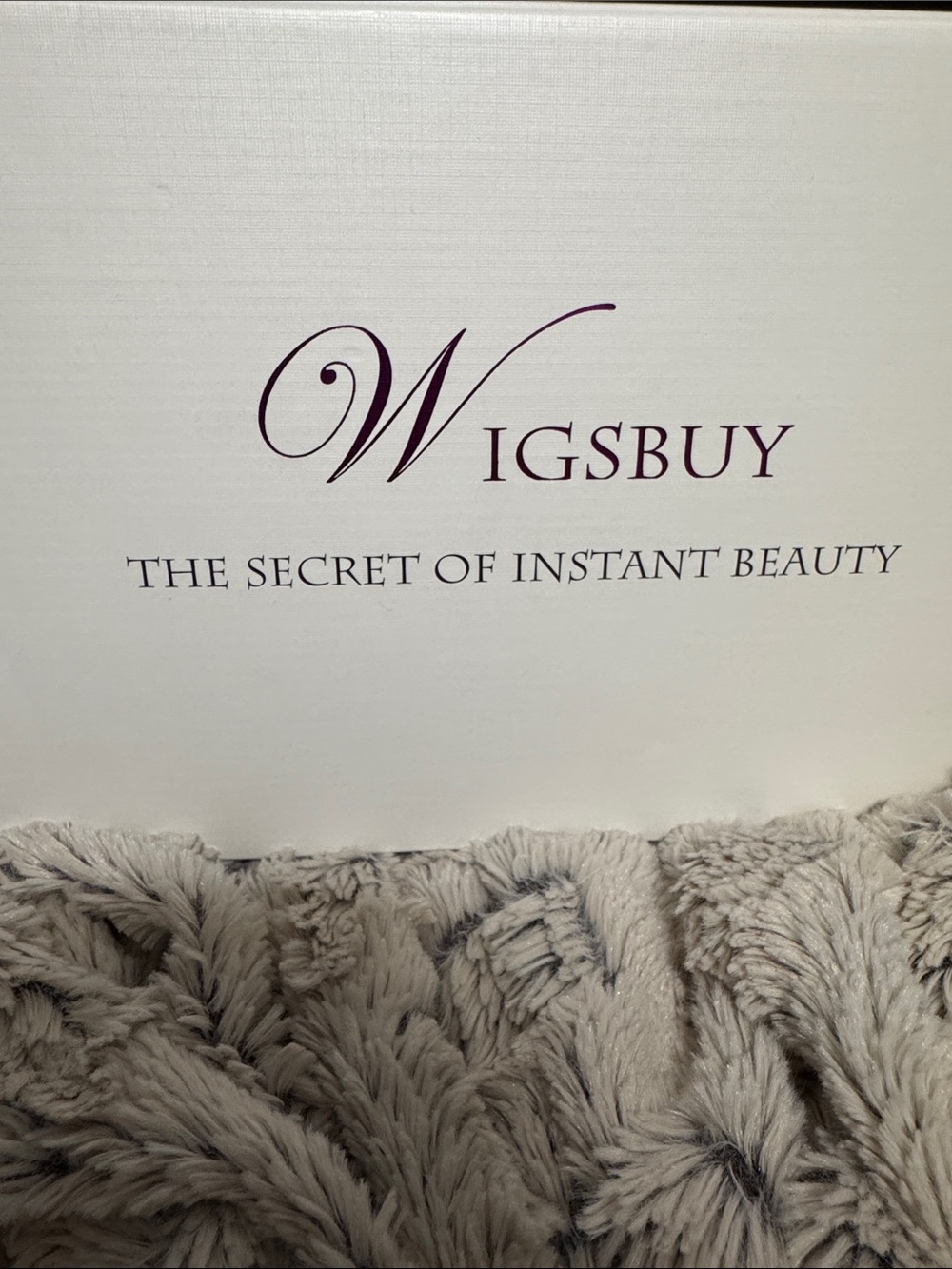 Wigsbuy: 100% human hair. Average size. Medium/light Golden Brown has hi-lights